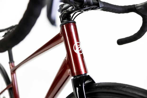 BICICLETA RUTA ALUBIKE SPORT ONIX 700C VINO T-54 18V