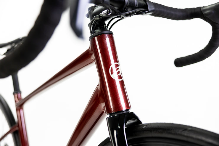 BICICLETA RUTA ALUBIKE SPORT ONIX 700C VINO T-54 18V